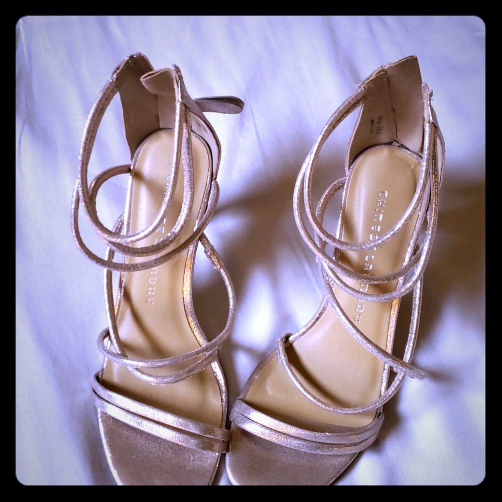 Gold heel strap shoes